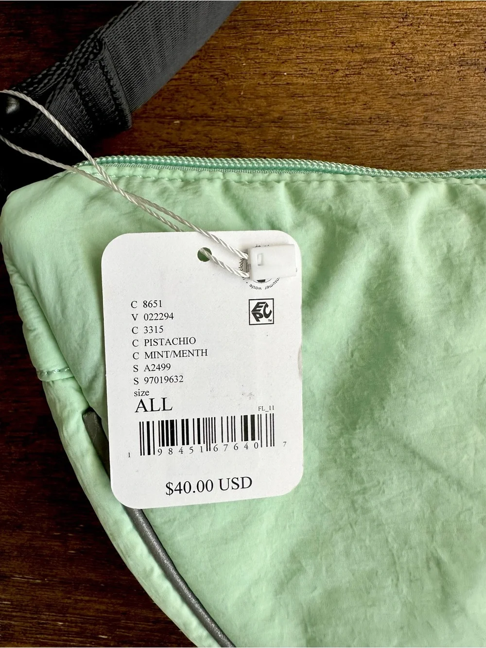 NWT FREE PEOPLE MOVEMENT BULL’S EYE CROSSBODY SLING BAG COLOR IS PISTACHIO!!